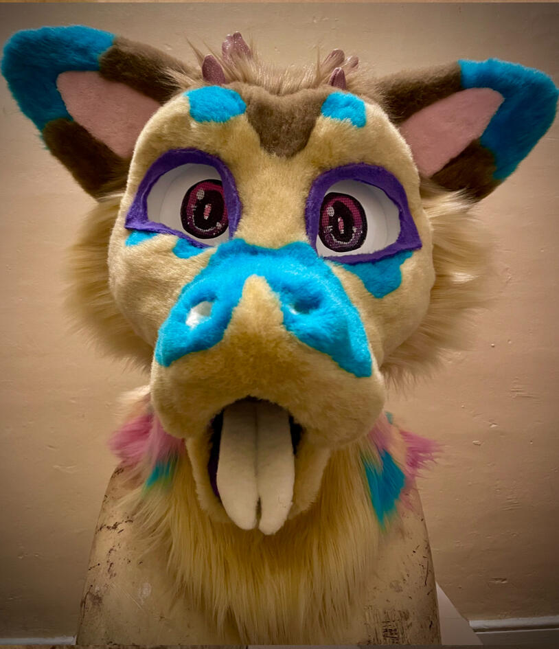 dragon fursuit head colorful four ears tan brown blue pink purple follow me eyes